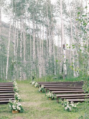 Bench Ceremony Seating at Ranch in Colorado With Simple Flowers and Aspens