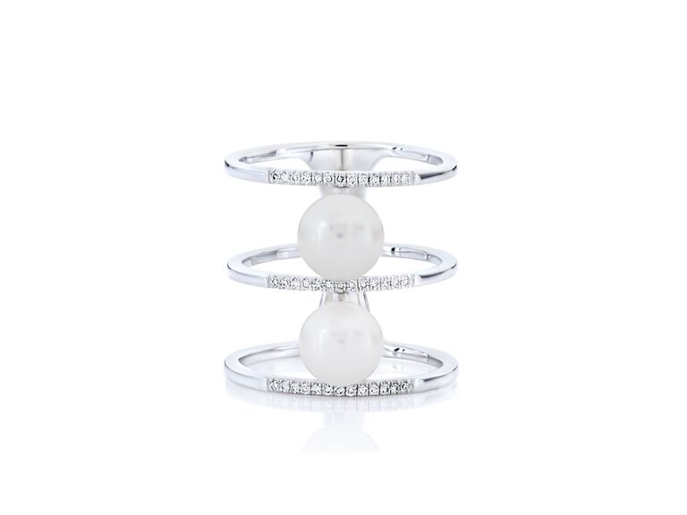 pearl two stone ring with white metal cage setting