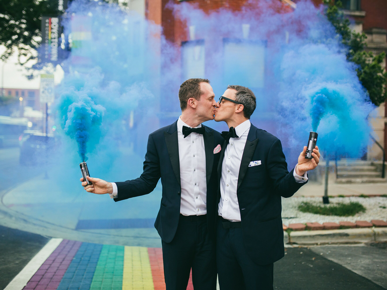 how to choose a wedding photography couple kissing with smoke cans