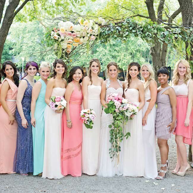 The bride took her three bridesmaids (her sister and two best friends) shopping, but let them pick out the dress they liked best. They're all tall and gorgeous, so it was more about finding the perfect blush color and making them feel comfortable, Tiffany says.