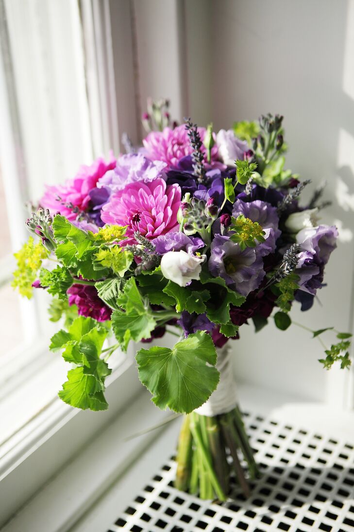 Kate carried a bouquet with chrysanthemums, lavender and greens. Floral design at her wedding was provided by Occasional Flowers.