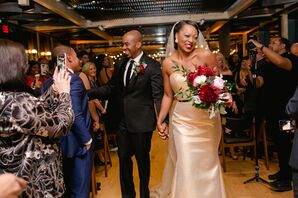 Couple Recessing at Winery Wedding with Guests