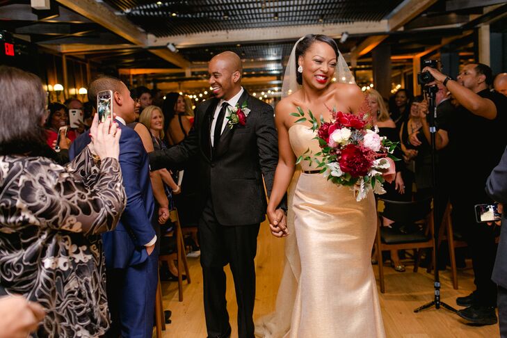 Couple Recessing at Winery Wedding with Guests