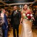 Couple Recessing at Winery Wedding with Guests