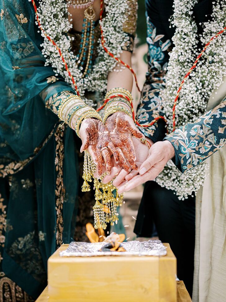 “Navigating an Indian ceremony with divorced parents was a unique experience, but we made the best decisions for us, like having my stepfather walk me down the aisle,” says Nikita.