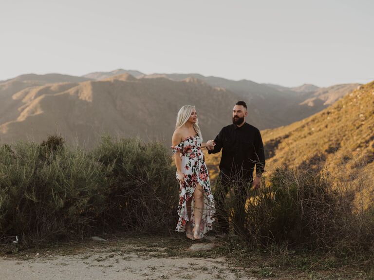 Couple walking through the hills of San Diego