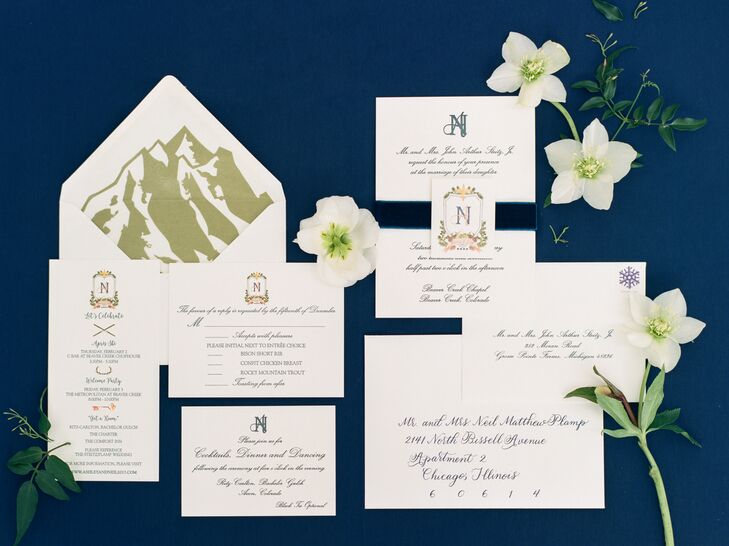 Ashley and Neil’s custom watercolor crest included a fleur-de-lis, depicted on the city flags of both Louisville (for Neil) and Detroit (for Ashley), and incorporated the stars of Chicago, where the couple met and fell in love. “Lastly, we had elements of the Rocky Mountains, where our wedding was held,” Ashley says. A lush navy velvet band was added to their invitations, to “make it cozy for winter.” The crest was carried throughout the wedding, from monograms to beverage trays—even on the inside of Neil’s tuxedo.
