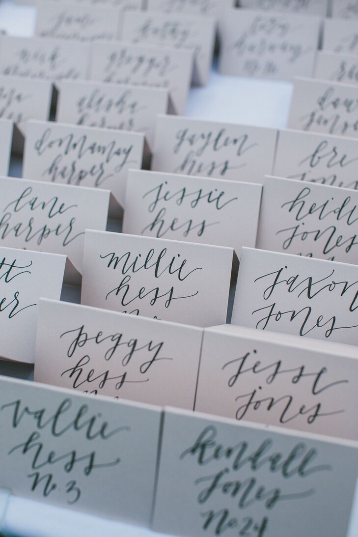 "We had blush pink escort cards with each guest's name written by a calligrapher," Elle says. "It was a really special detail that I know guests enjoyed—we even had guests tell us they saved theirs."
