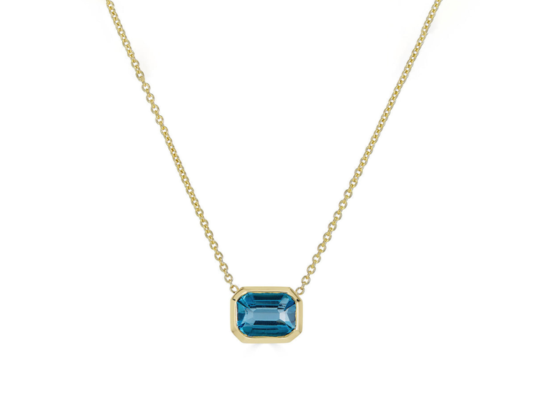 Blue topaz bezel stone pendant necklace on gold chain