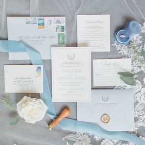 Classic Paper Goods with Calligraphy and Pastel-Blue Accents