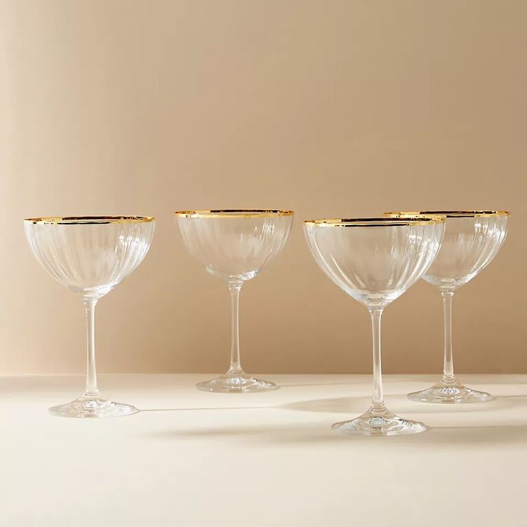 Set of four crystal champagne flutes. 