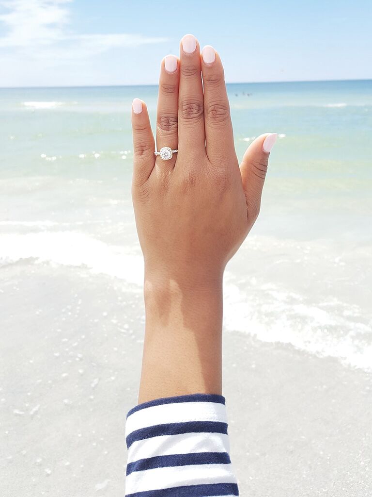 Engagement ring selfie idea with a beachy background