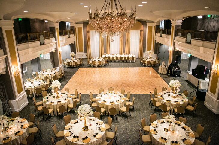 The reception was at the Lord Baltimore Hotel. The art deco set room had high ceilings with a large chandelier at the center. The couple filled it with Great Gatsby quotes in large ornate gold frames and art deco inspired pillows for the lounge area during the cocktail hour.