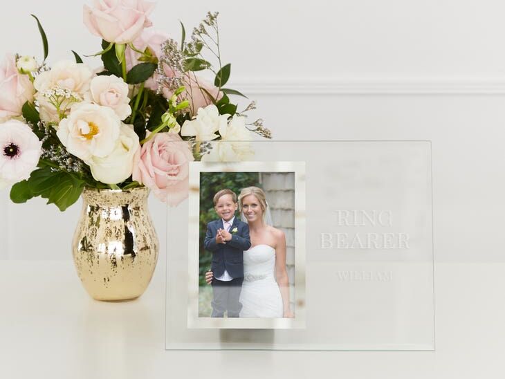 A personalized glass ring bearer frame from The Knot Shop