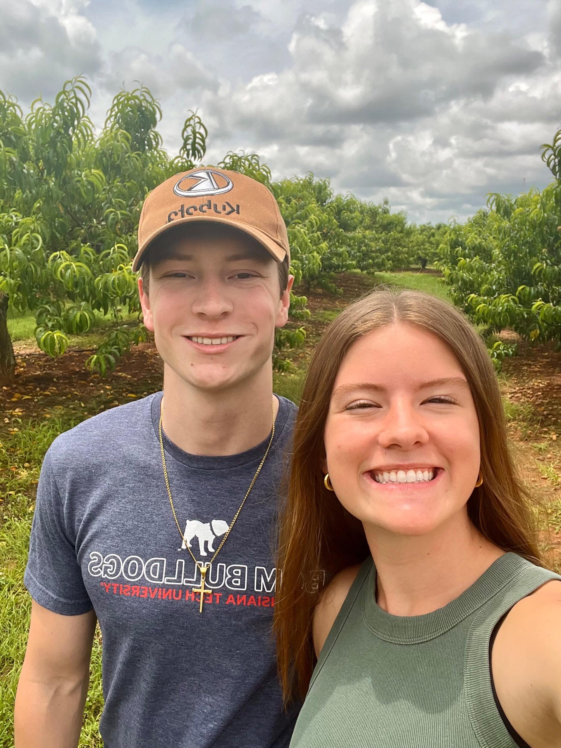 Our first picture together! Annie showed Beau around the peach farm