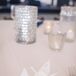 In the weeks before the wedding, Cat and her family folded over 1,000 paper cranes, a symbol of love, to incorporate into the wedding’s decor. In addition to the chandelier that hung over the dance floor, she used the cranes as escort cards, writing the name of each guest on the origami birds.