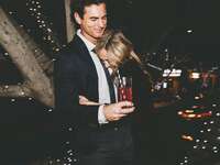Couple hugging at their anniversary party