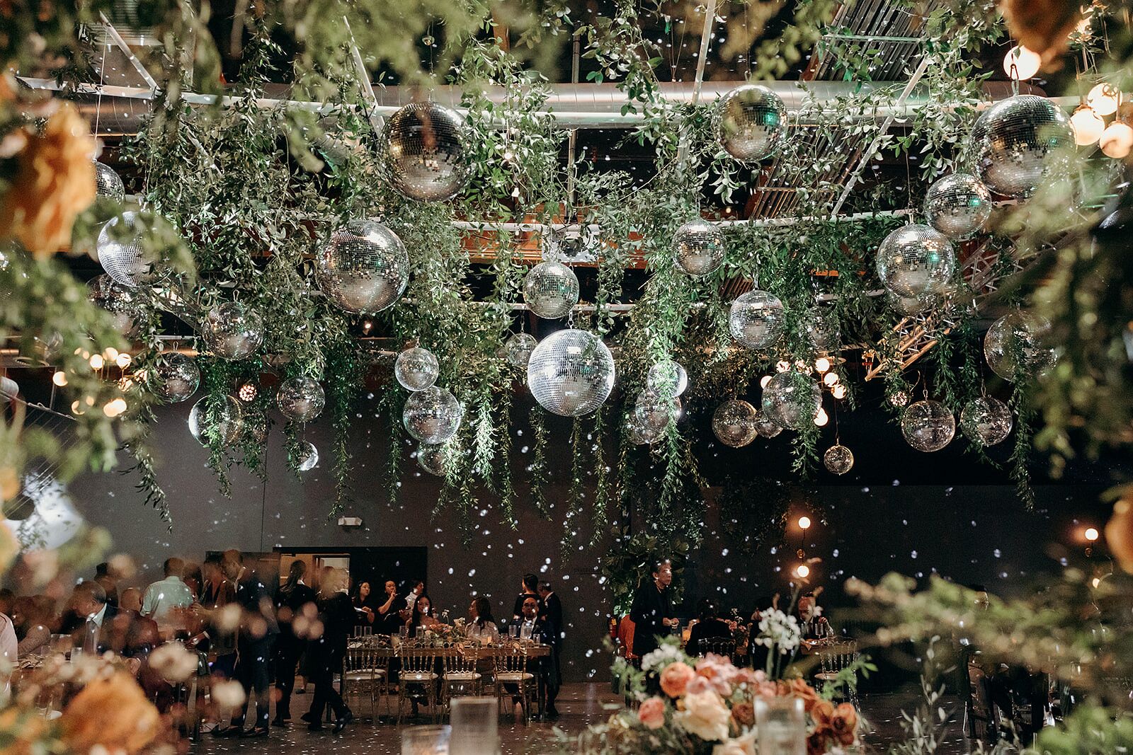 Hanging Greenery Installation of Winding Ivy and Disco Balls Over Dance Floor, Flowers