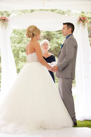 White Draped Arch for Outdoor Ceremony