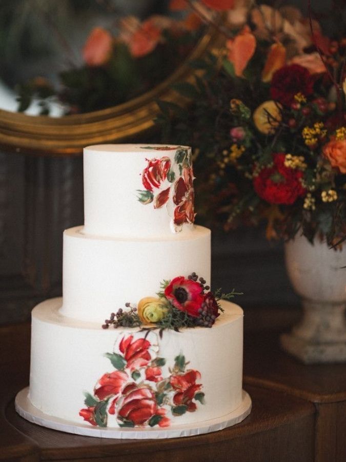 cake with red hand-painted details