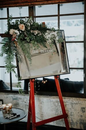 Sign on Easel with Tropical Flowers and Art Deco Typography