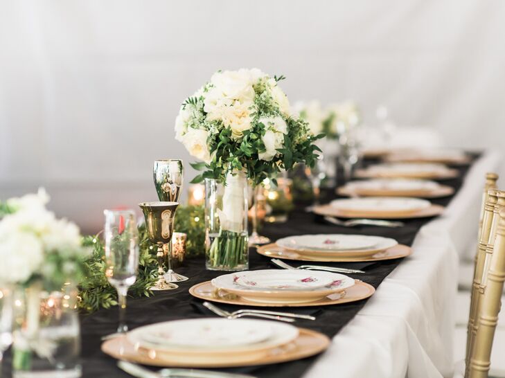 Instead of numerous floral centerpieces, Kassi opted for simple green garlands wrapped with fairy lights.