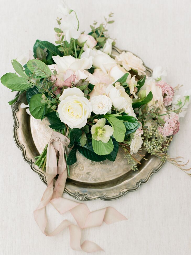 The flowers were romantic, lush and organic combinations of ranunculus, garden roses, hellebores and veronica, finished with smilax, seeded eucalyptus and bay leaves.