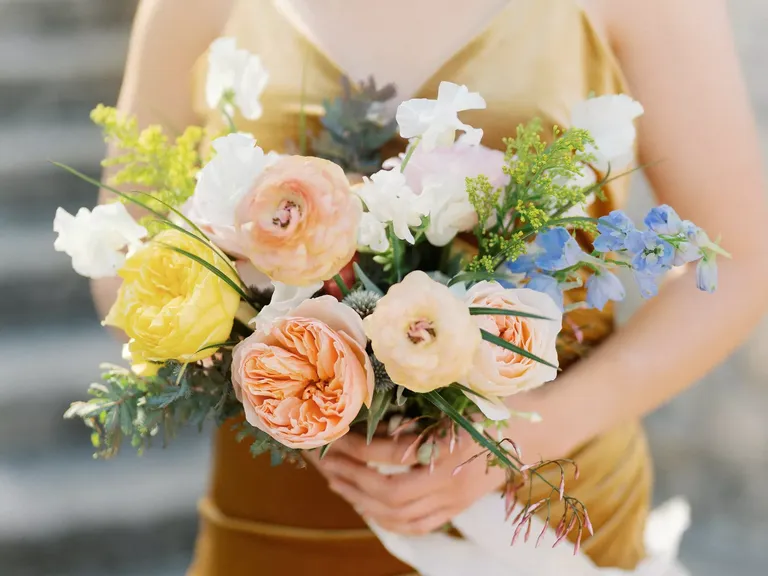 Boho Bridesmaid Bouquet with Yellow Ranunculus and Peach Roses