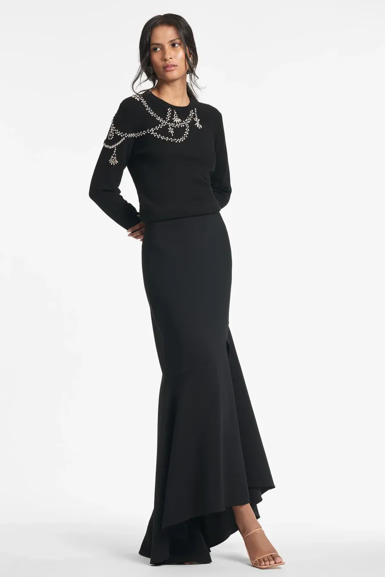 bedazzled sweater paired with maxi skirt