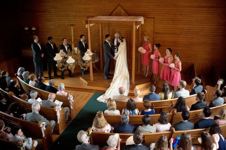 "We knew we wanted a Jewish ceremony, but we also wanted to honor the Hindu, Muslim, and Christian backgrounds of our parents," says Nellie. "Bob Alper, the rabbi who named me as a baby, happens to be a stand-up comedian in Vermont, and came out of retirement to officiate our ceremony."  The couple stood under a custom wooden chuppah, covered by a lace tablecloth belonging to Nellie's grandmother.