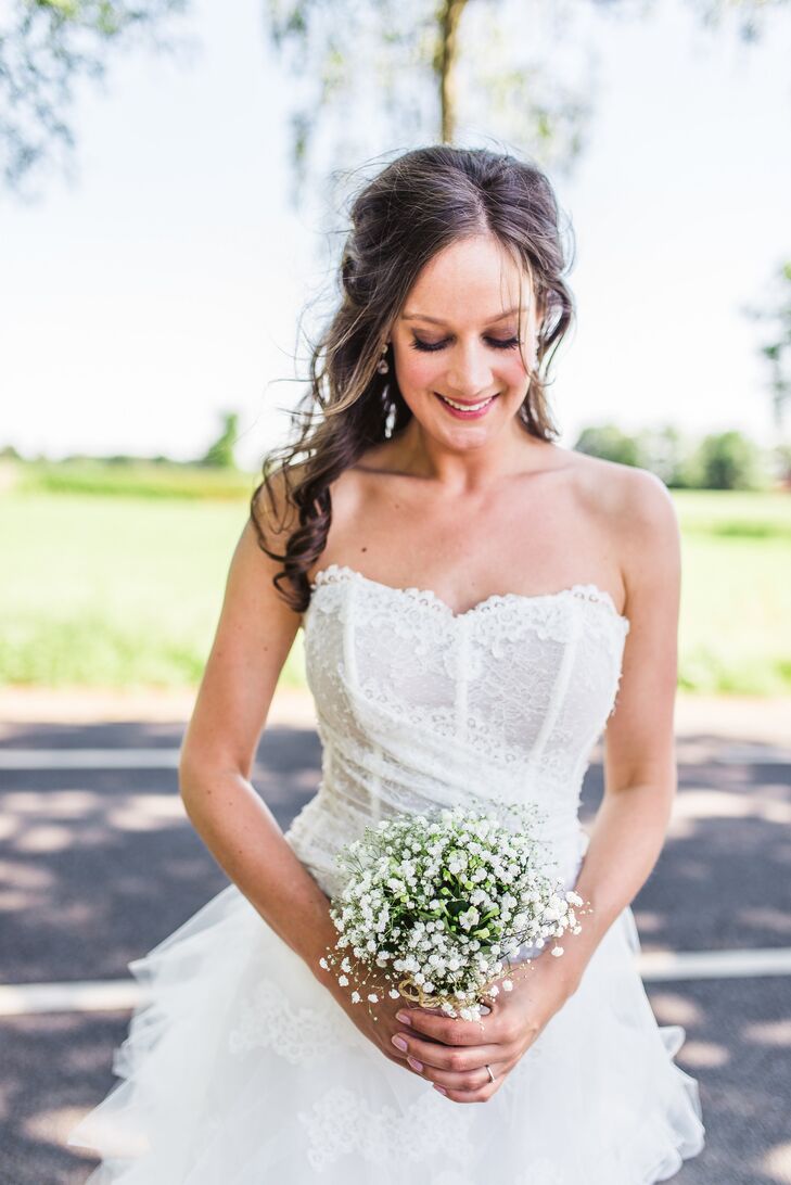 Amanda carried a simple bouquet made entirely of baby's breath.