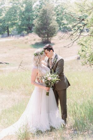 Bride and Groom Portraits in Field in Saugatuck, Michigan