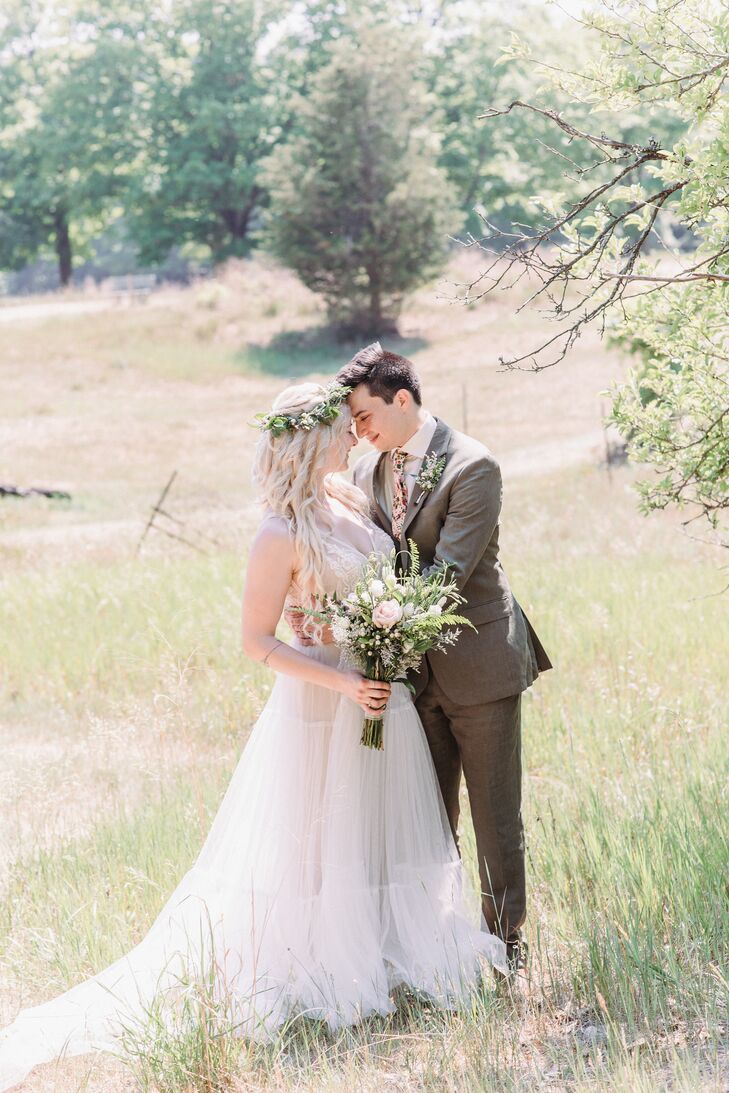 Bride and Groom Portraits in Field in Saugatuck, Michigan