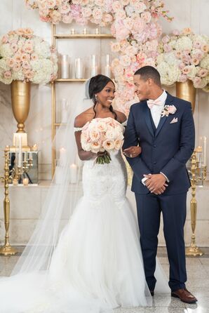 Bride and Groom with Roses, Candles and Gold Details