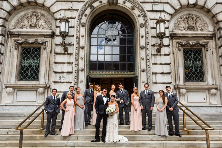 Couple and Wedding Party on Venue Steps