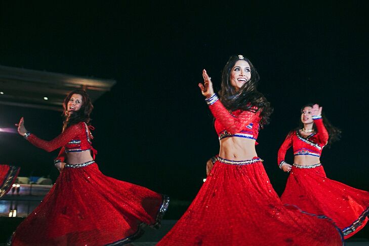 The couple flew in three dancers from the Sa Dance Company in New York City to perform for the Bollywood-themed sangeet. The 22-member bridal party followed the professional dancers with a performance of their own.
