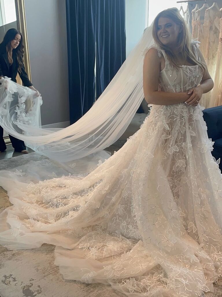 woman in wedding dress with long veil