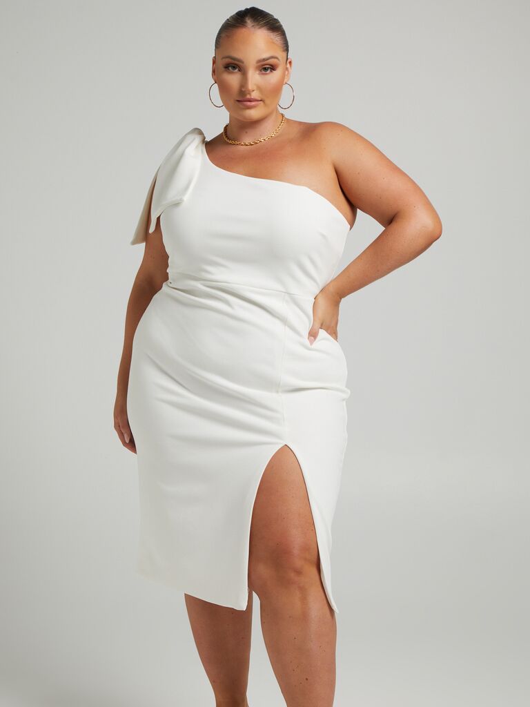one-shoulder engagement dress for the bride with bow detail and side slit
