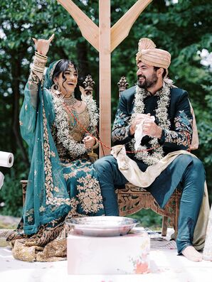 Bride Laughing During Traditional Indian Wedding Ceremony