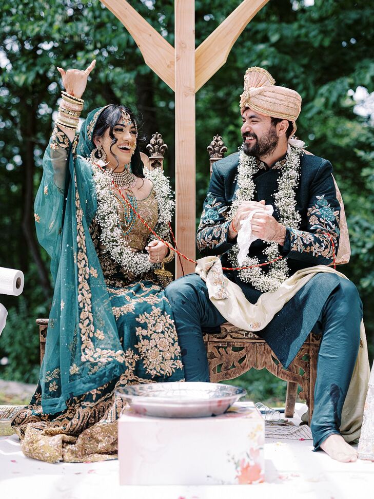 Bride Laughing During Traditional Indian Wedding Ceremony