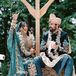 Wedding Party Dressed in Traditional Indian Lehenga and Sherwani Outfits