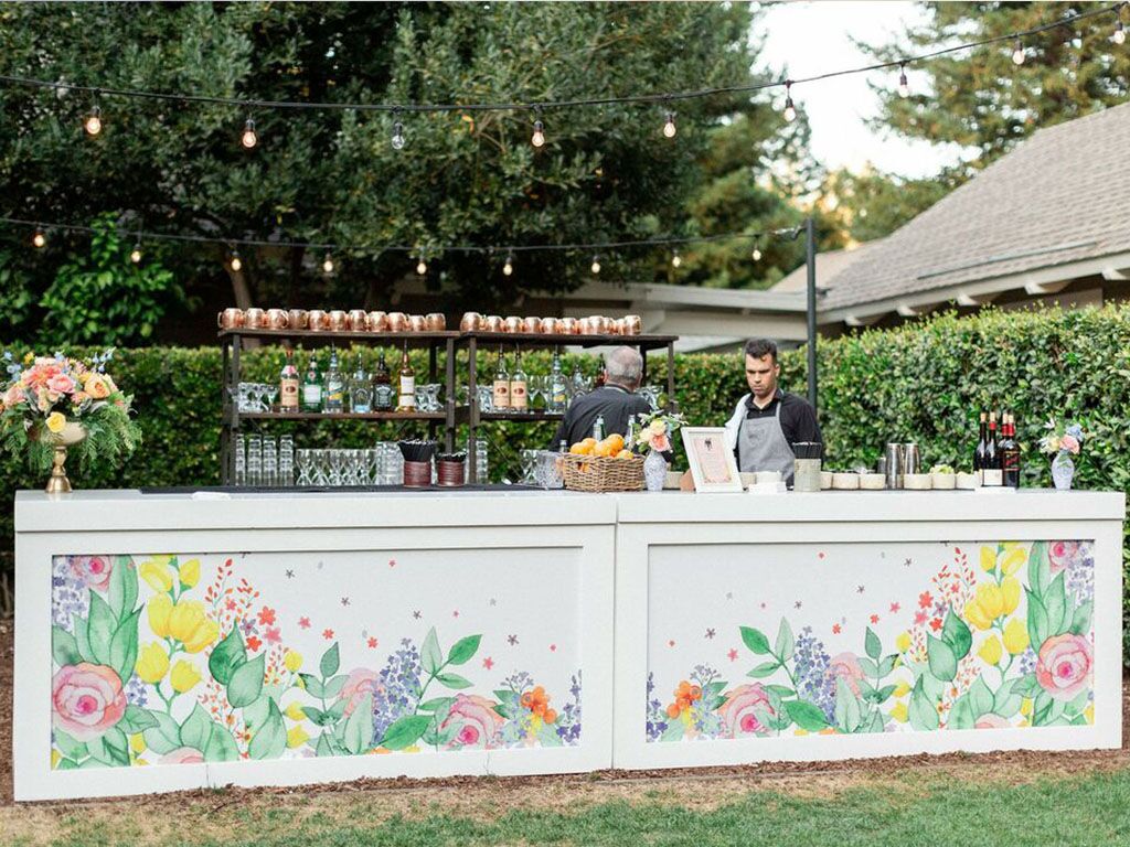 How to Hire a Bartender for Your Wedding, According to Experts