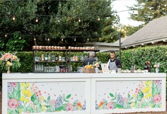 How to Hire a Bartender for Your Wedding, According to Experts