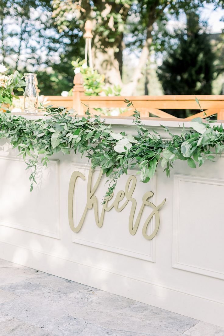 Simple white bar with laser-cut sign as decoration