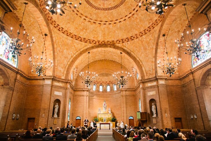 Amanda and Alex exchanged vows in a Catholic communion service at Basilica Shrine of St. Mary in Wilmington, North Carolina. “St. Mary’s Basilica is absolutely beautiful with its high arches and dome ceiling,” Amanda says. “There wasn’t much decor needed.”
