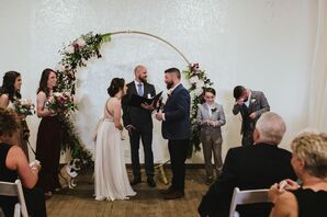 Modern Indoor Ceremony with Circular Wedding Arch