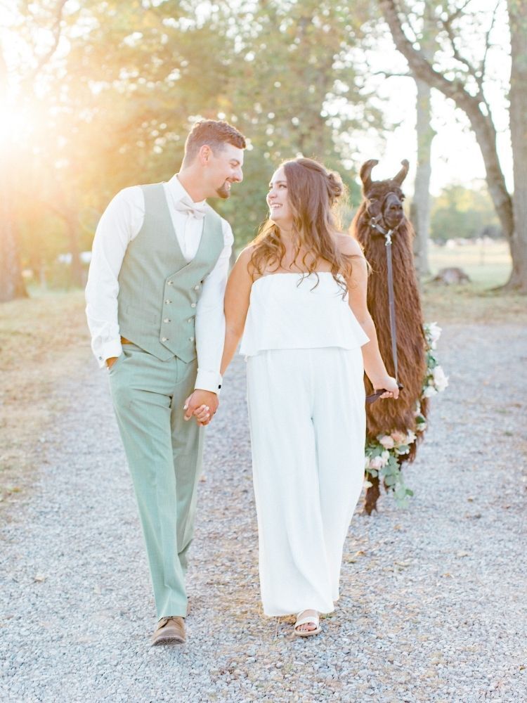 spring engagement photo with llama