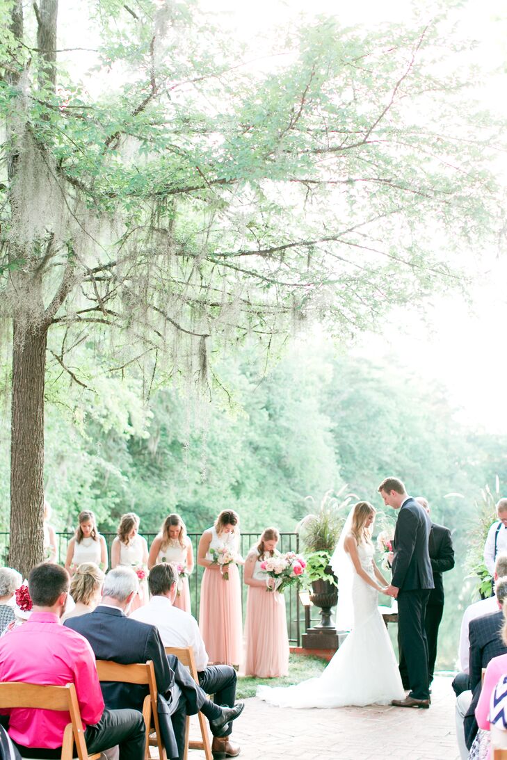 "The venue was so romantic with lots of trees and  flowers and gorgeous hanging moss everywhere!" Jamie says of the Millstone at Adam’s Pond. "And although it was right outside downtown, you would have no idea. It was perfectly tucked away and hidden in the trees. It was charming, romantic, beautiful, intimate—everything we wanted!"