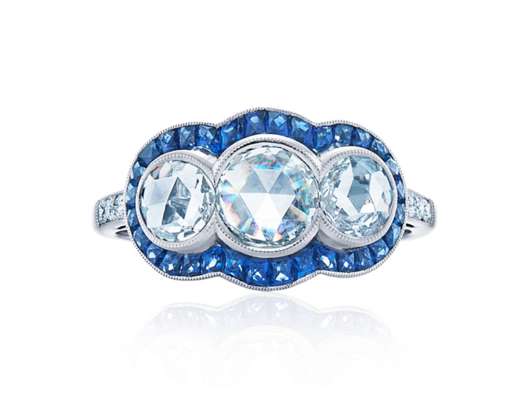 Three round diamonds and sapphire ahlo