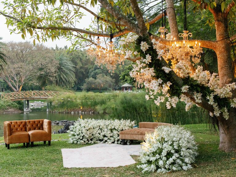 Glamorous lounge seating with chandeliers